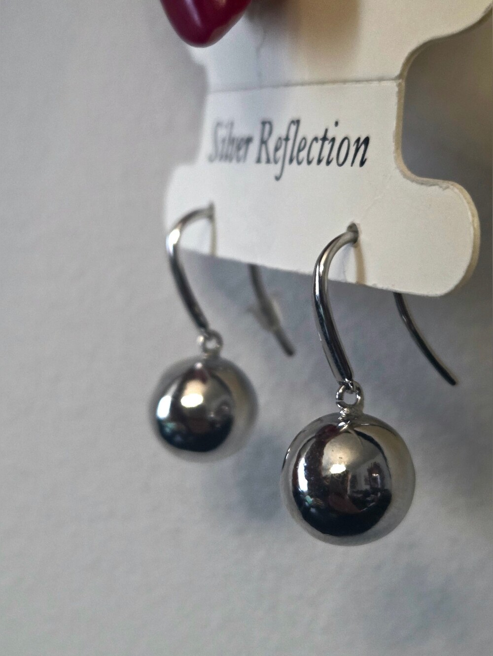 Fashion Designer Jewelry. Polished Silver Ball Drop Earrings. Silver Color.